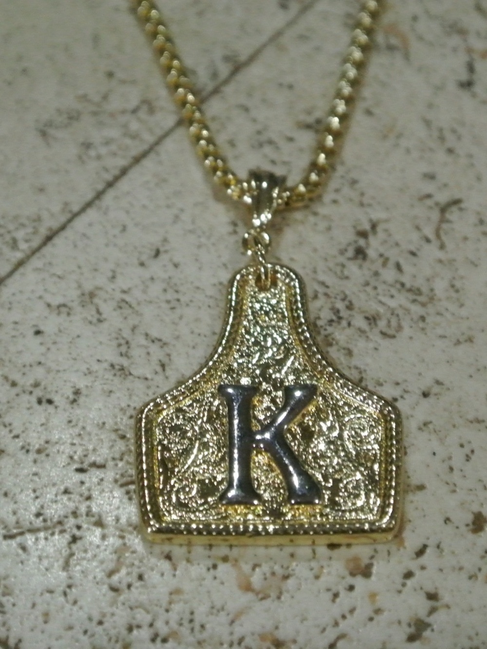LETTER K GOLD PLATED CATTLE TAG NECKLACE